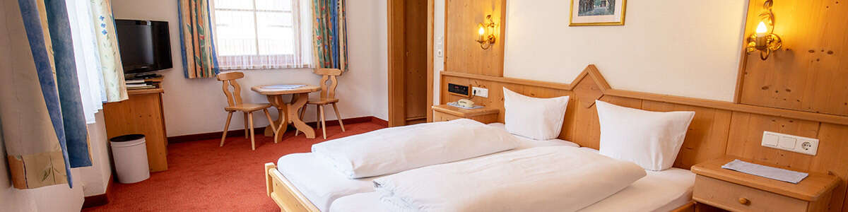 Großzügige Zimmer im Hotel Persura in Ischgl